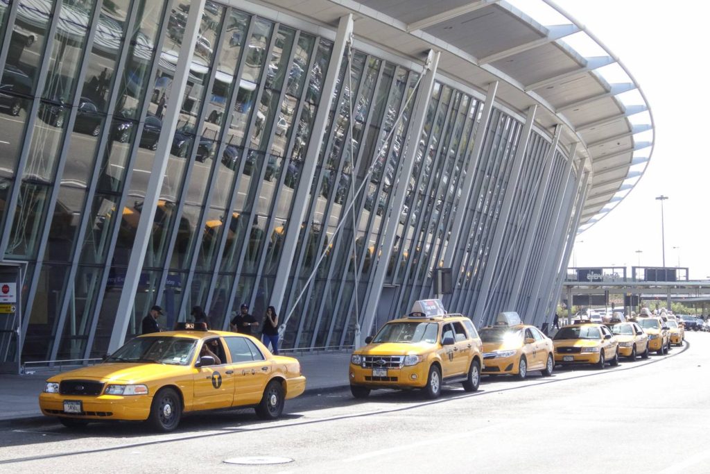 Getting Around JFK Airport Transportation Guide Curbside Yellow Taxis 1024x683 